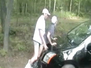 Rough anal gay fuck against a car